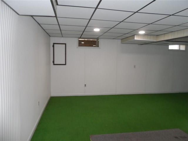 basement featuring a drop ceiling