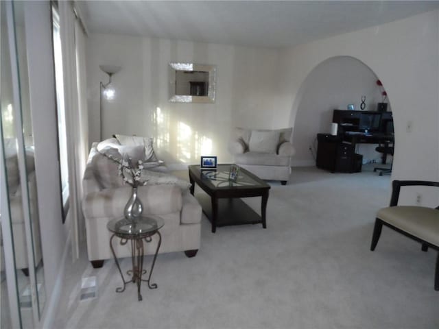 living room with light colored carpet