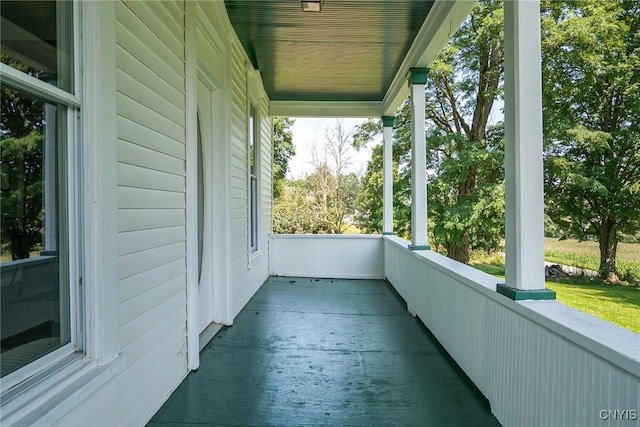 balcony featuring a porch