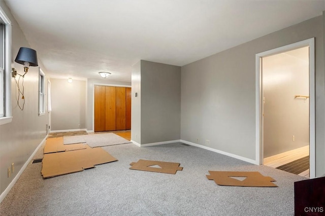 empty room featuring light carpet