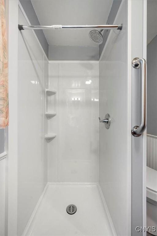 bathroom featuring walk in shower