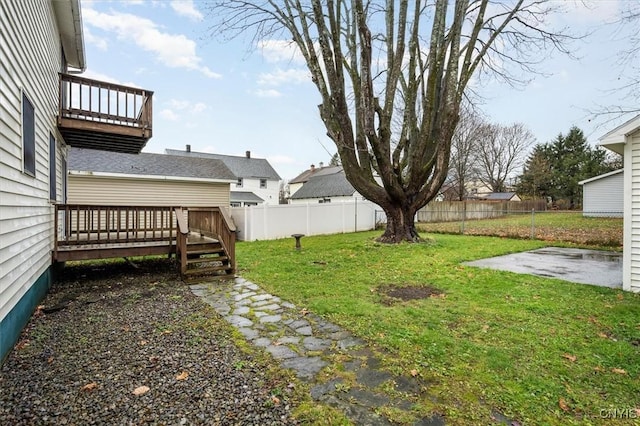 view of yard with a patio area and a deck