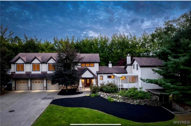 view of front of property with a garage