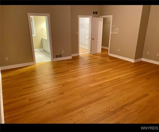 empty room featuring light hardwood / wood-style floors