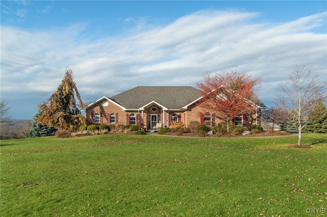 ranch-style house with a front yard