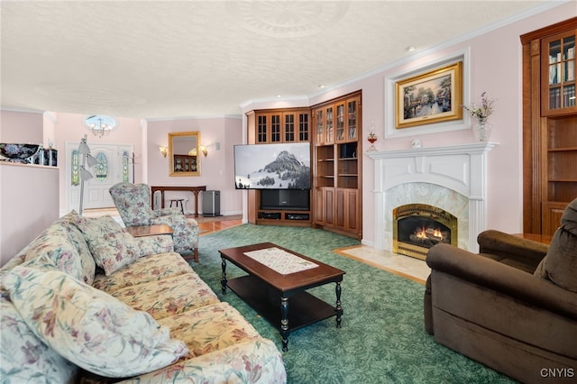 carpeted living room with a textured ceiling and crown molding