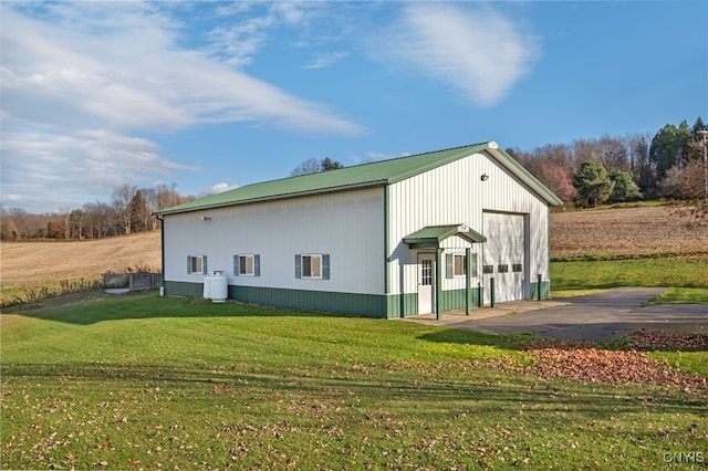 view of home's exterior featuring a yard