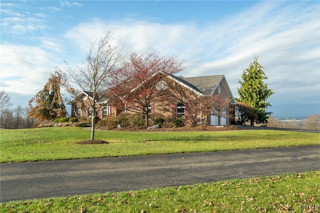 view of front of property with a front lawn