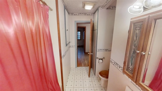 bathroom featuring toilet