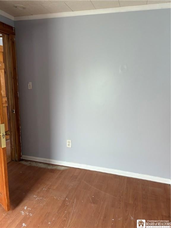 empty room featuring hardwood / wood-style floors