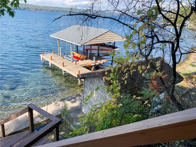 view of dock with a water view