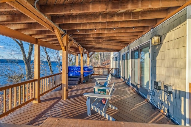 deck featuring a water view