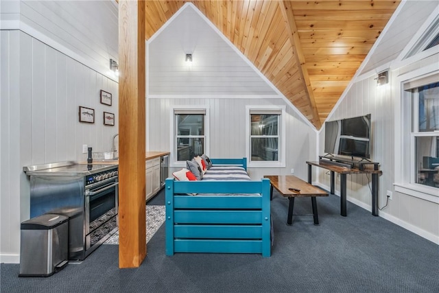 living area with dark carpet, lofted ceiling, wooden walls, and wooden ceiling