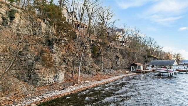 exterior space with a water view