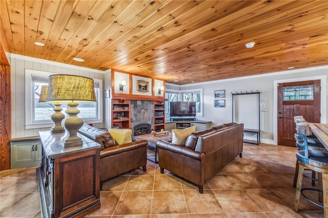 living room featuring ornamental molding, wooden ceiling, and light tile patterned flooring