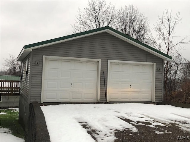 view of snow covered garage