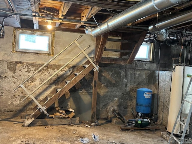 basement with gas water heater and plenty of natural light