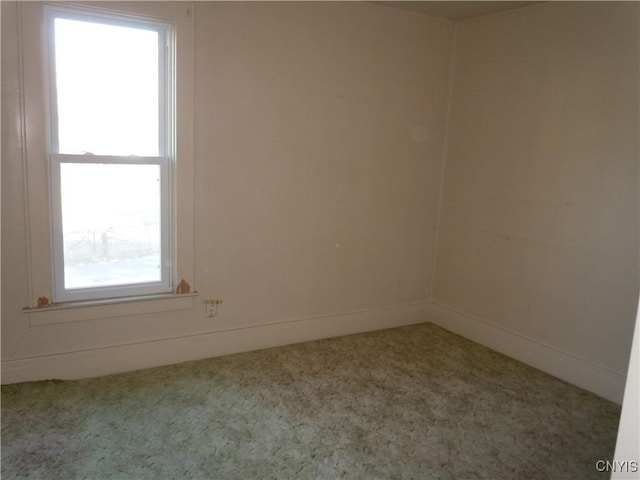 view of carpeted spare room