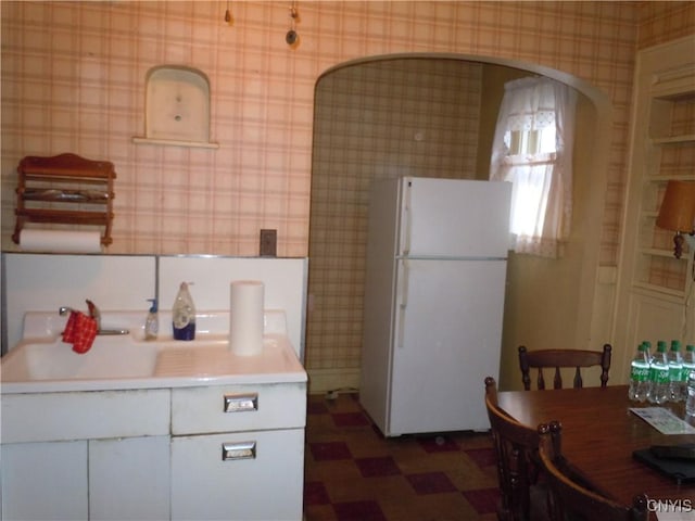 kitchen featuring white refrigerator