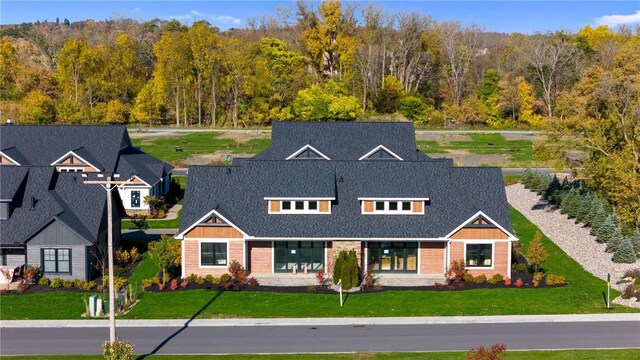 view of front of property with a front lawn