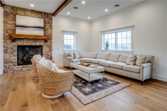 205 Charles Herrmann Way Unit 205, Milo, NY 14527 - living room with baseboards, recessed lighting, wood finished floors, and visible vents