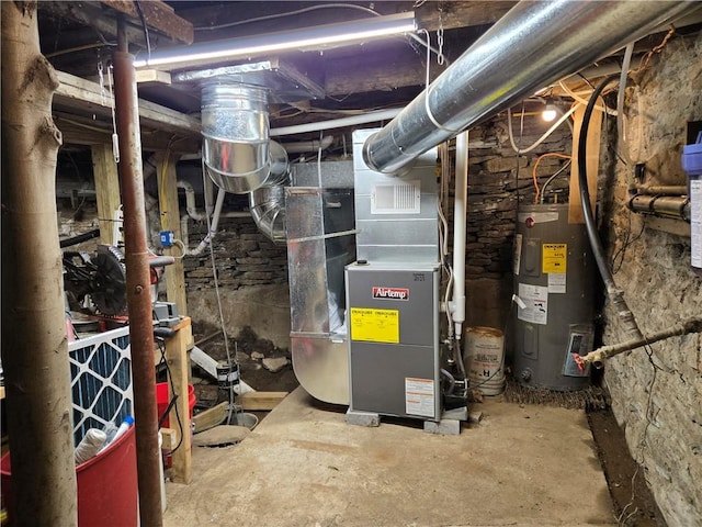 utility room with heating unit and electric water heater