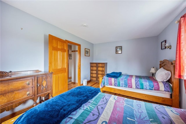 bedroom featuring hardwood / wood-style flooring