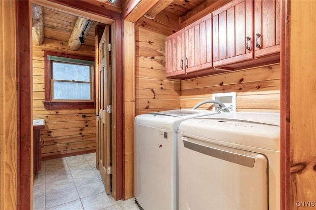 laundry room with separate washer and dryer, wood walls, and wooden ceiling