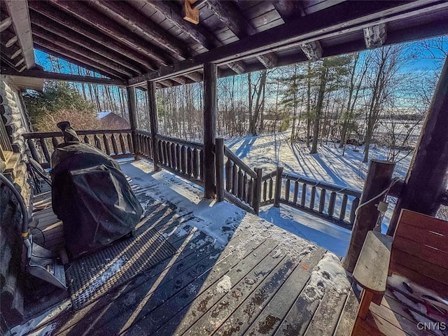 view of snow covered deck