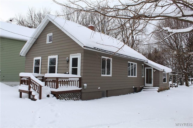 view of snow covered house