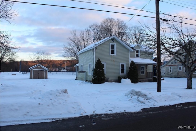 exterior space featuring a storage shed