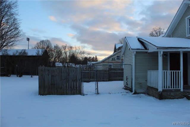 view of yard layered in snow