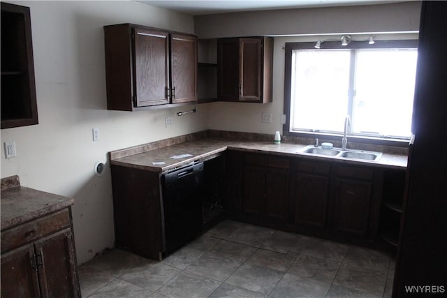 kitchen featuring dishwasher, dark brown cabinets, and sink