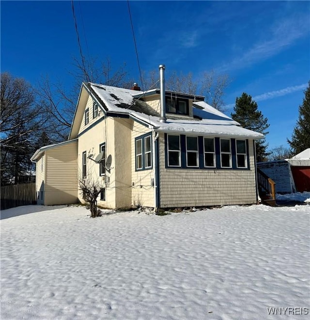 view of snow covered property