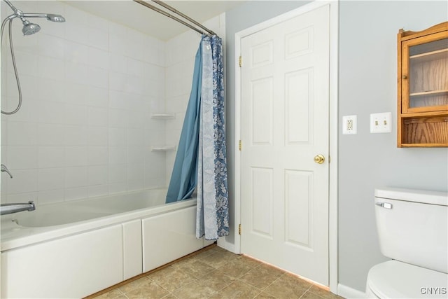 bathroom featuring tile patterned floors, shower / tub combo with curtain, and toilet