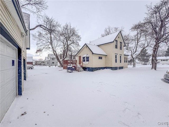 view of snow covered property