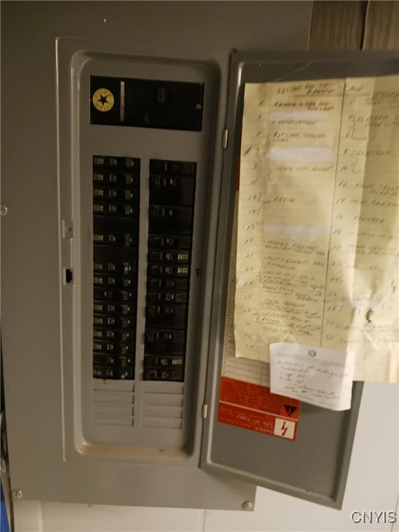 utility room featuring electric panel