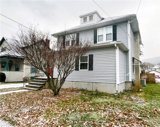 view of front of house with central AC