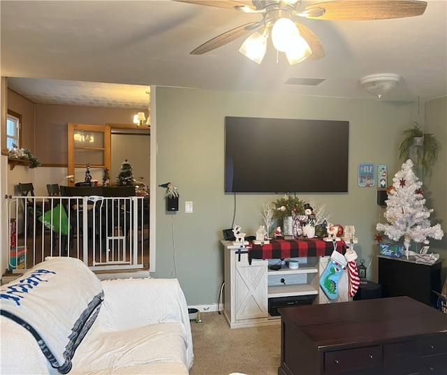 bedroom with light colored carpet and ceiling fan