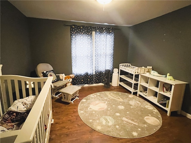 bedroom featuring hardwood / wood-style flooring