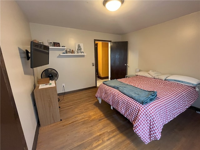 bedroom featuring hardwood / wood-style flooring