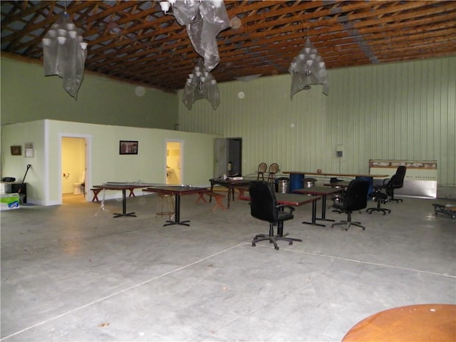 recreation room featuring concrete floors