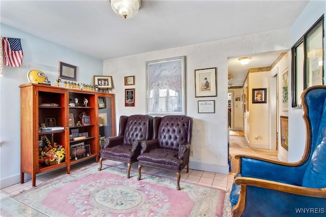 sitting room with light tile patterned flooring