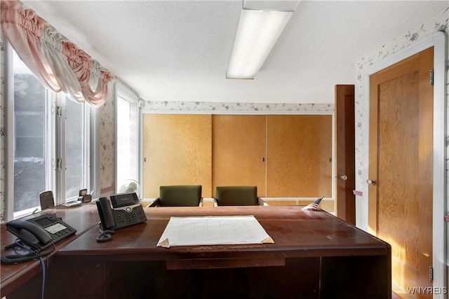 office area featuring a textured ceiling