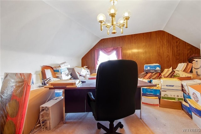 carpeted office space with lofted ceiling, an inviting chandelier, and wooden walls