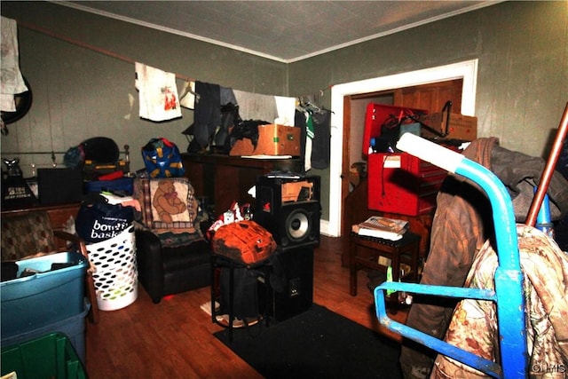 interior space featuring hardwood / wood-style floors and ornamental molding