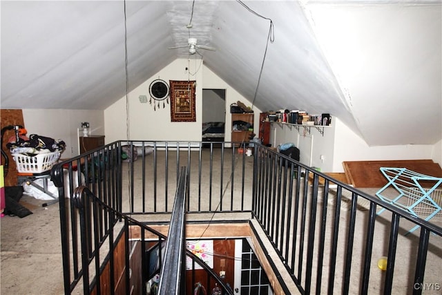 additional living space with ceiling fan and vaulted ceiling