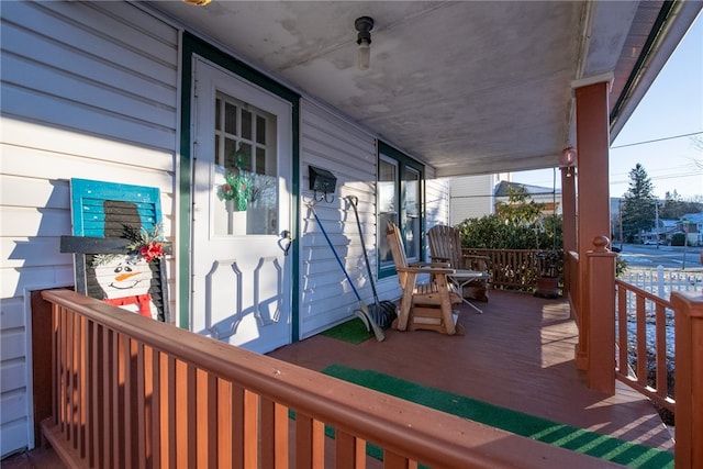 wooden deck featuring a porch