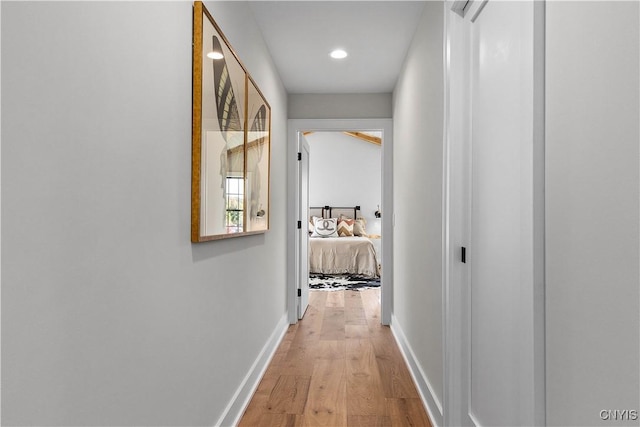 corridor featuring wood-type flooring