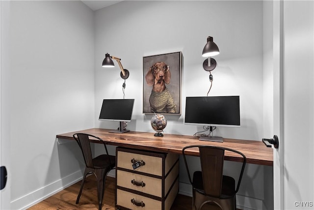 office area with hardwood / wood-style floors